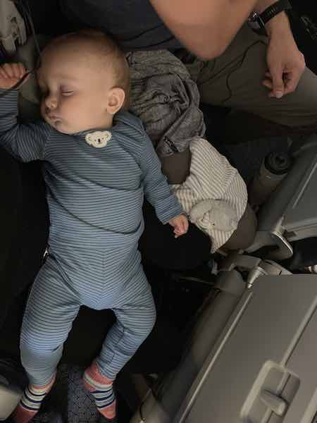 sleeping baby on airplane