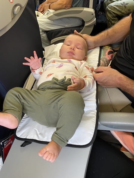 how to change a baby's diaper on a plane