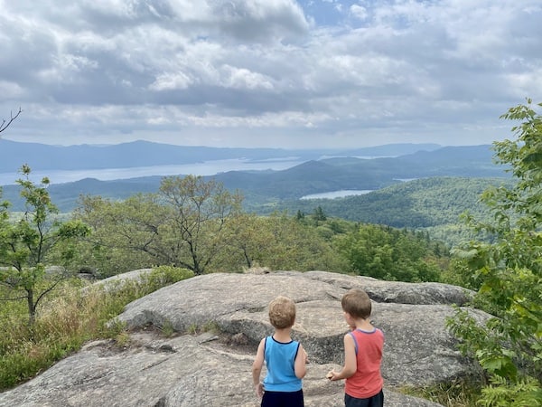 my two toddlers hiking to a mountain top