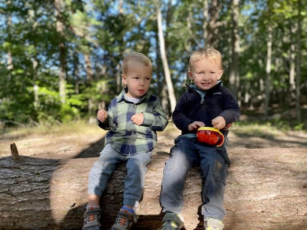 my two toddlers hiking on snack break
