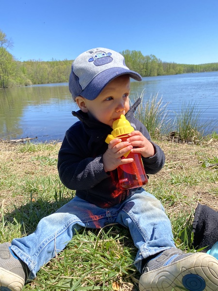 My 1 Year Old Enjoying a Break on a Hike with his water bottle