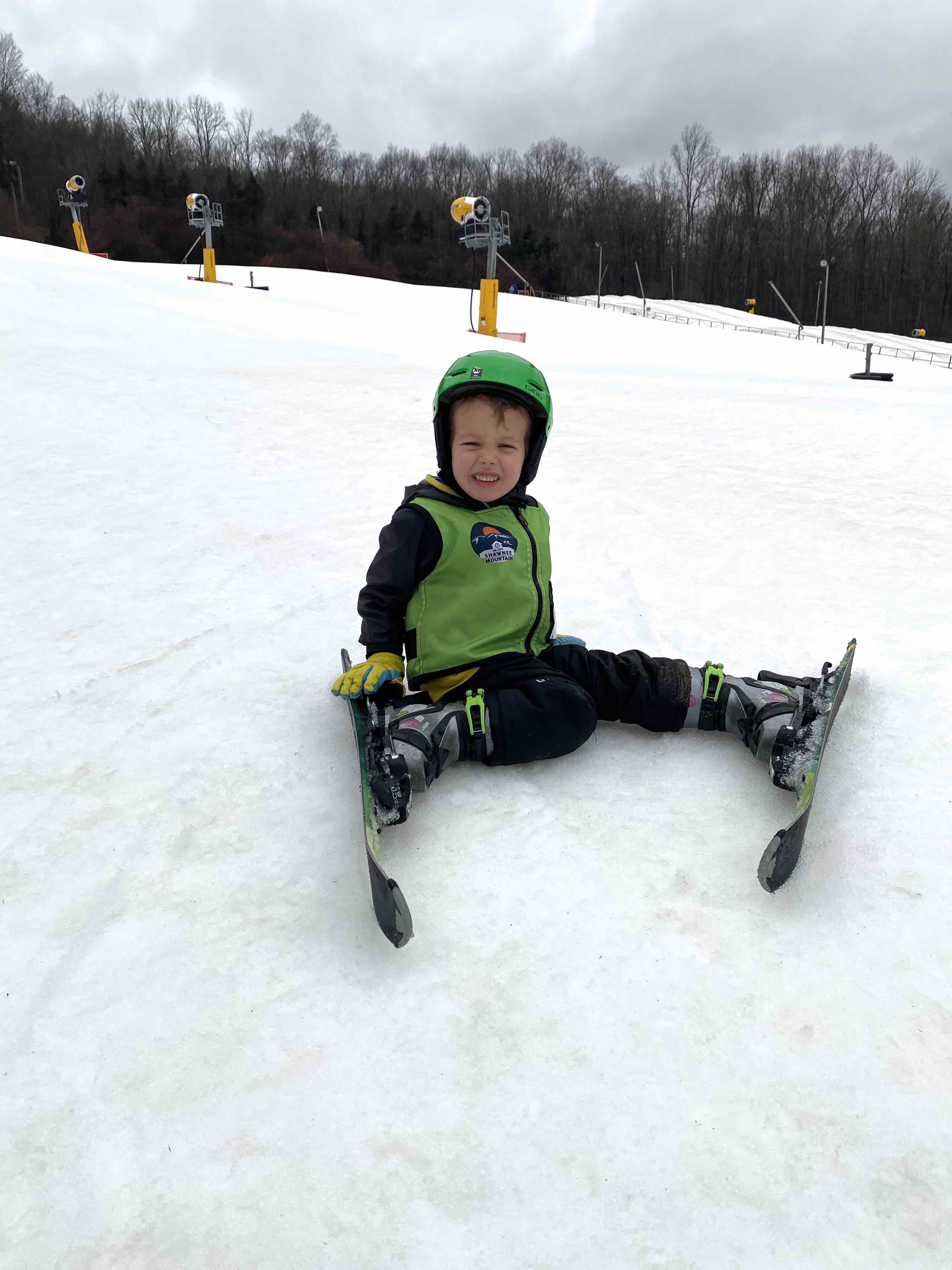 3 year old falling in the snow