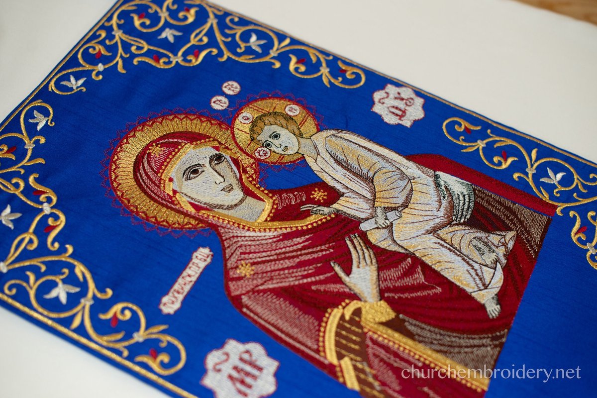 Orthodox priest nabedrennik  with the icon of Theotokos, white or bue