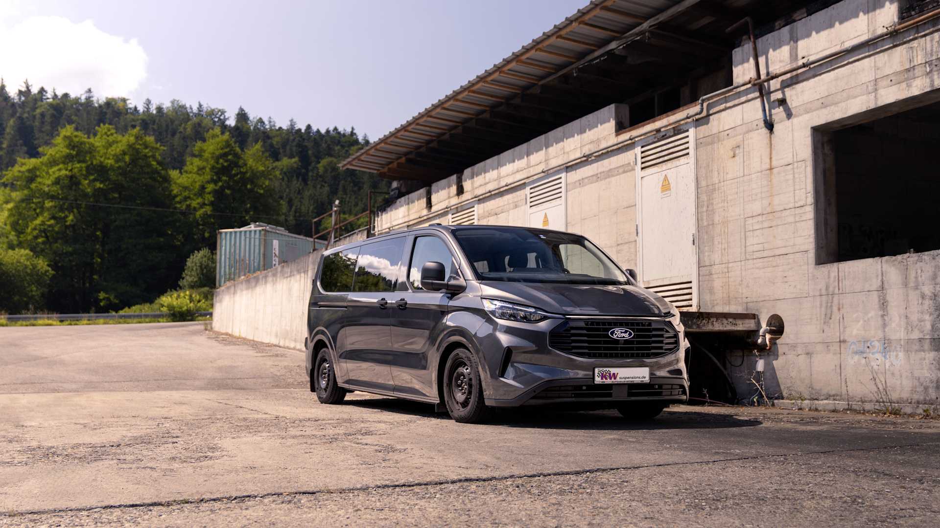 Ford Transit Custom with KW V3 coilovers in an industrial area