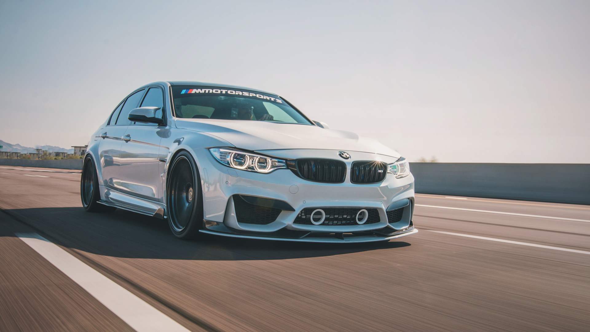 BMW M3 F80 with KW V3 coilover suspension - driven on the highway with a lowered ride height
