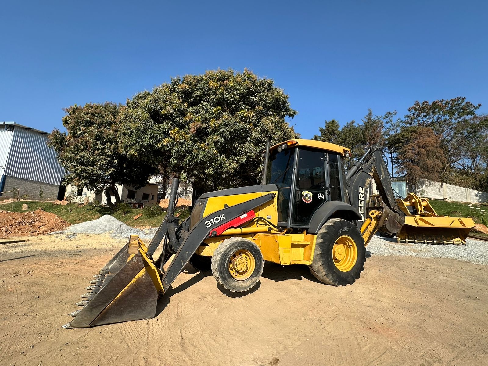 Retroescavadeira John Deere 310K