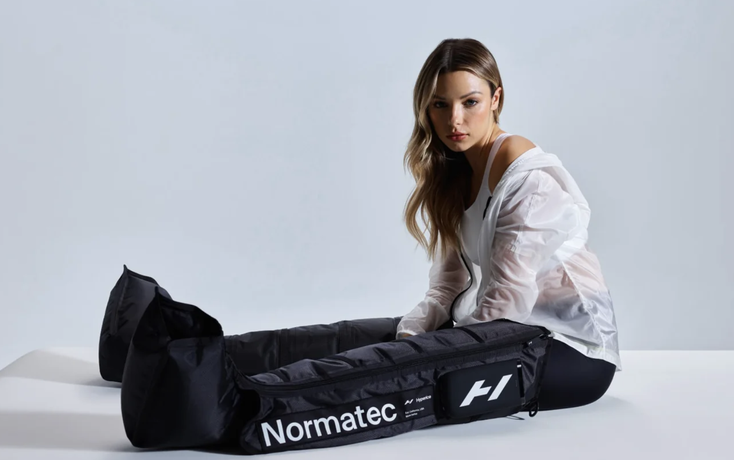 Hyperice recovery products available at 10% off for STRIDE Fitness members, including Hypervolt percussion massagers, Normatec compression boots, and Vyper vibration rollers