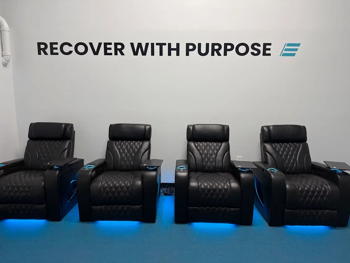Anti-gravity massage chair in the Recovery Zone at STRIDE Fitness Huntington Beach for spinal decompression and post-workout recovery
