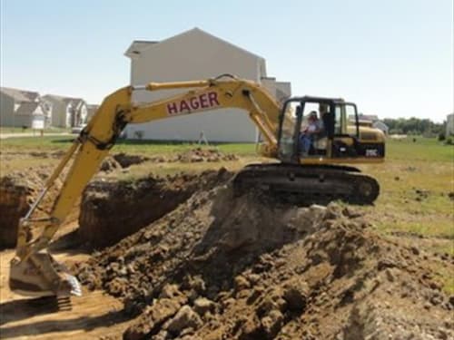 Hager excavator digging, original photo