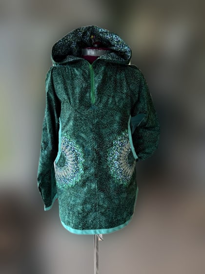 Green kuspuk with medallion-pattern pockets, adult medium, by Rose Tepp