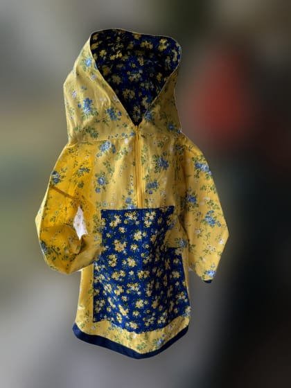 Child's yellow and blue floral kuspuk by Rose Tepp