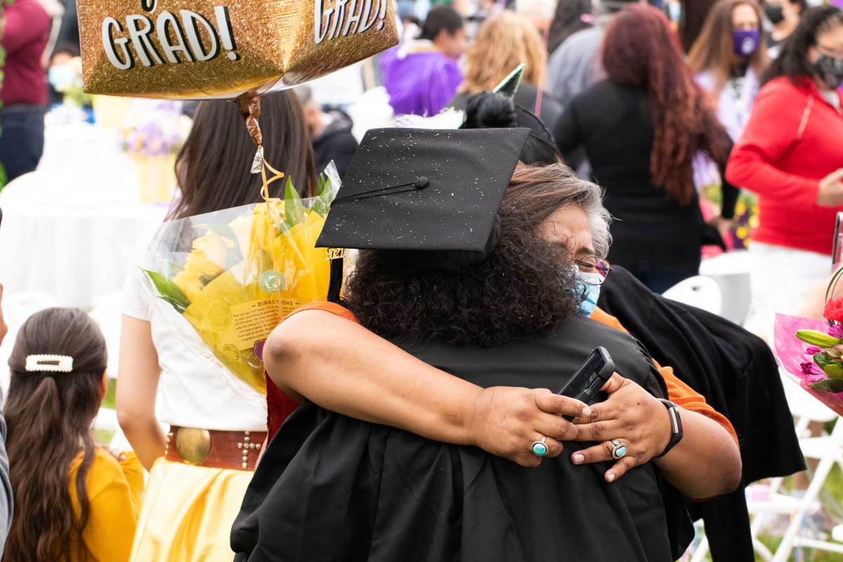 Graduation hug
