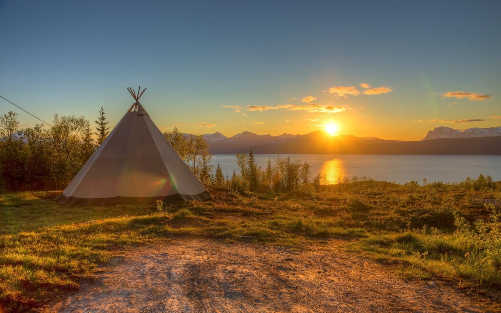 A tipi at sunrise — the Tree of Life Gathering