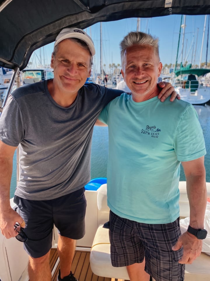 Mike Siegel and Gary Ricke on a boat in Redondo Beach harbor