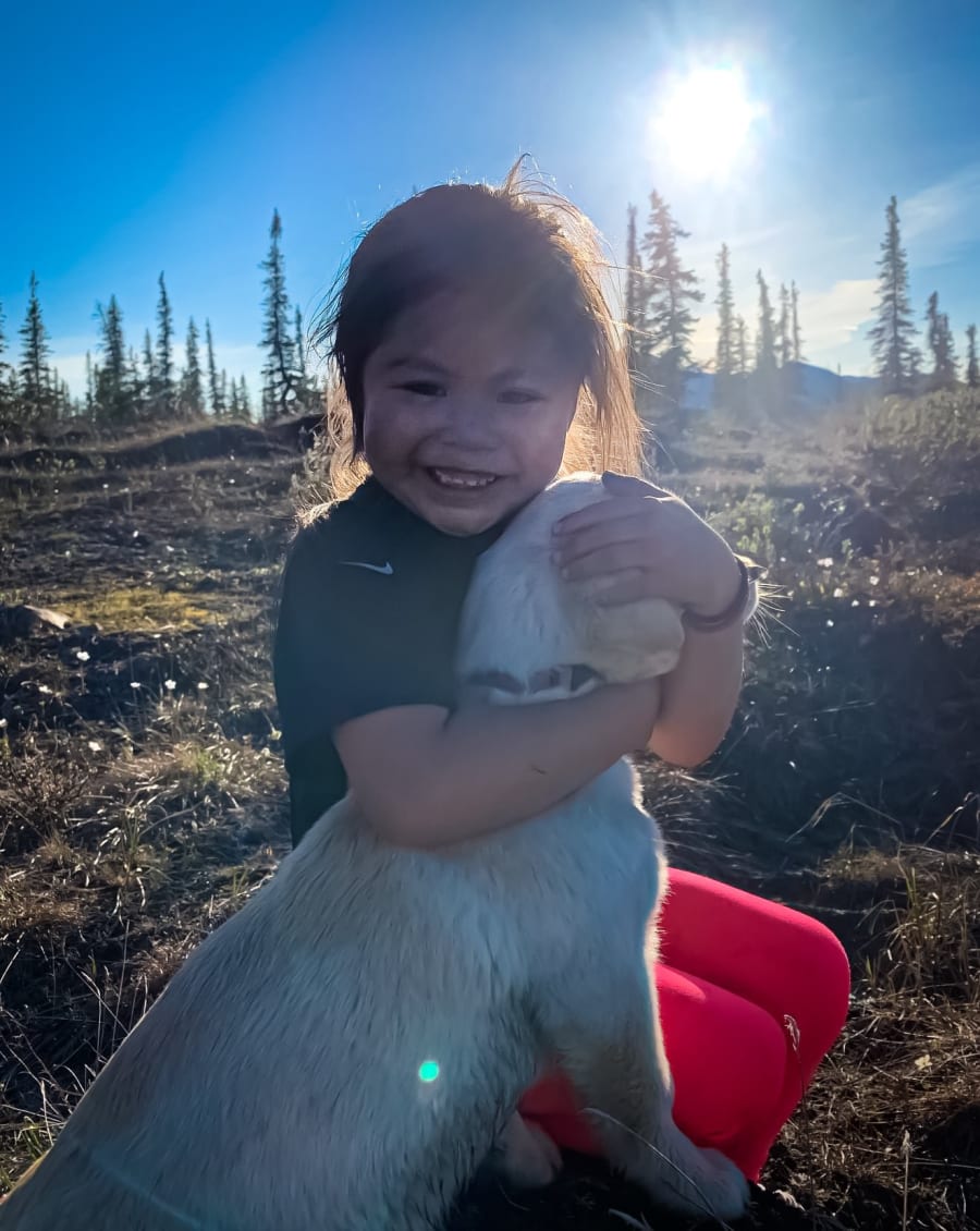 Native girl with dog