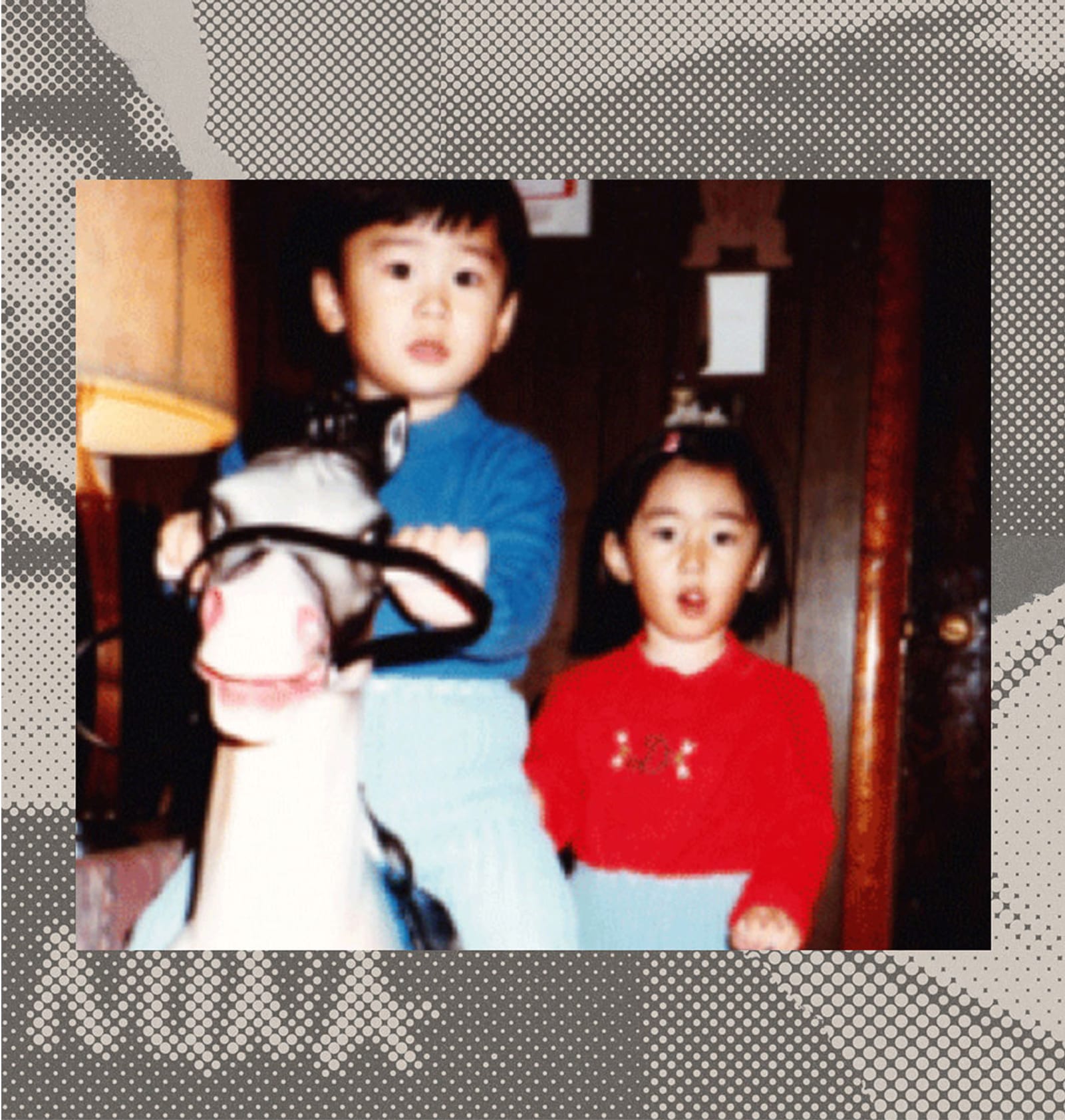 A young Jini Kim with her younger brother as children