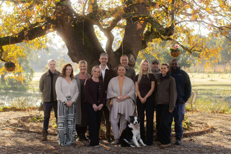 The Mornington Green team gathered under the old oak tree