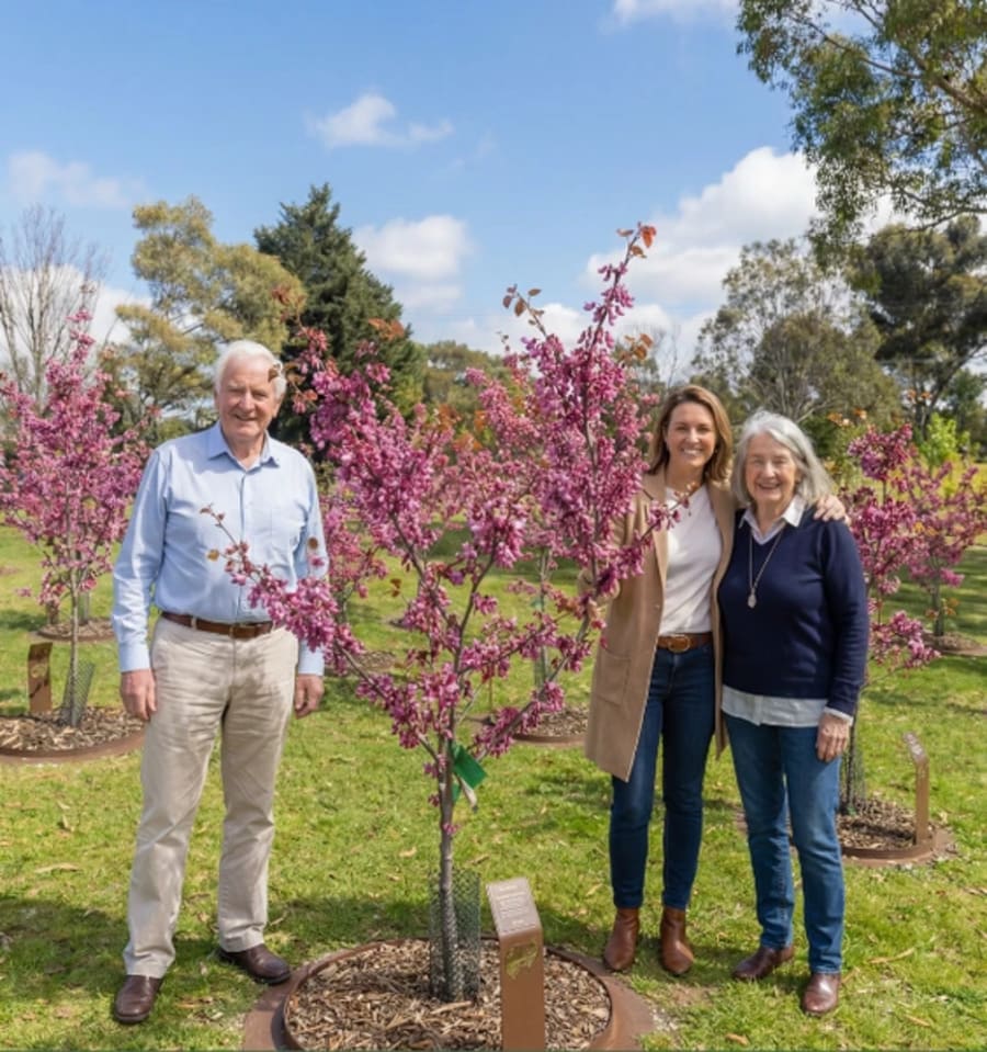 Families visiting the Living Legacy Gardens at Mornington Green.