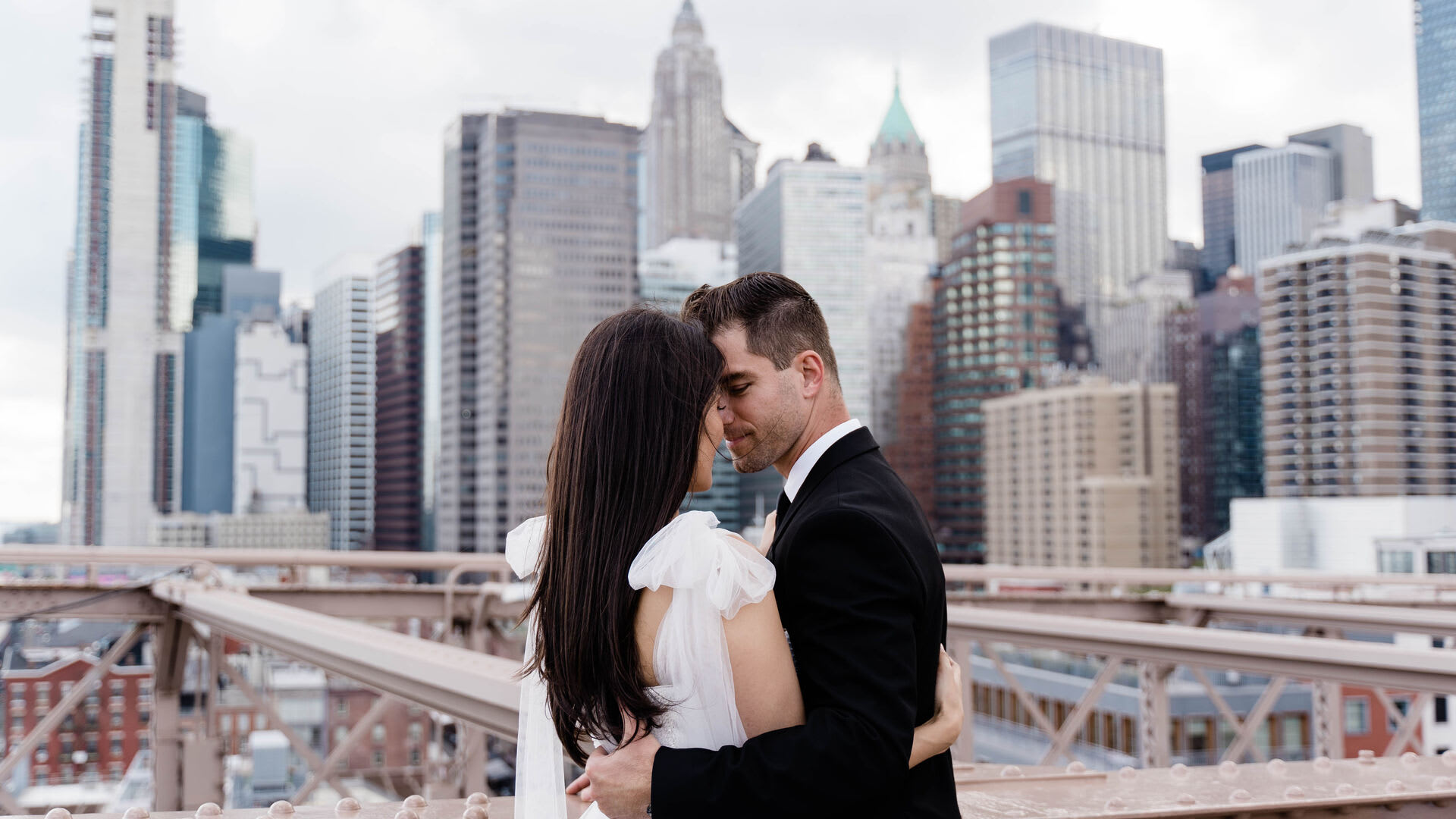 Couple at elegant candlelit wedding table