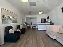 Serene spa waiting room design with comfortable seating