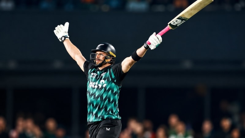 New Zealand batters celebrating after smashing record-breaking T20I total against India in Auckland match