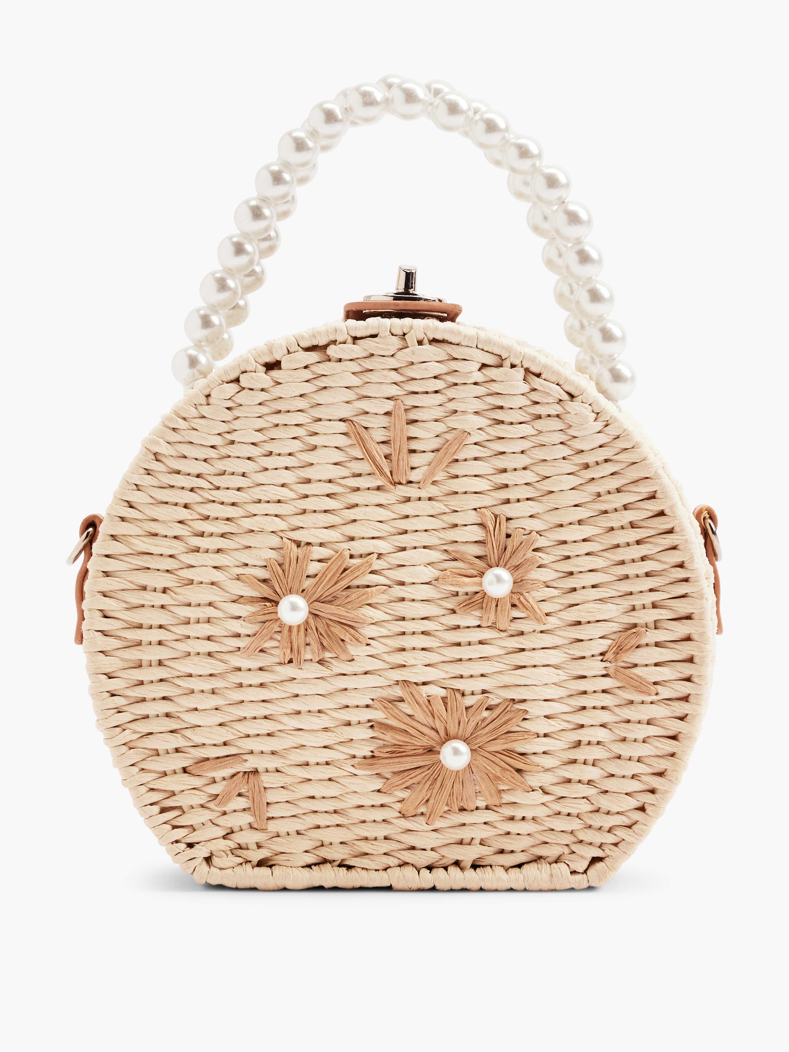 Runde Basttasche mit aufgestickten Blumen