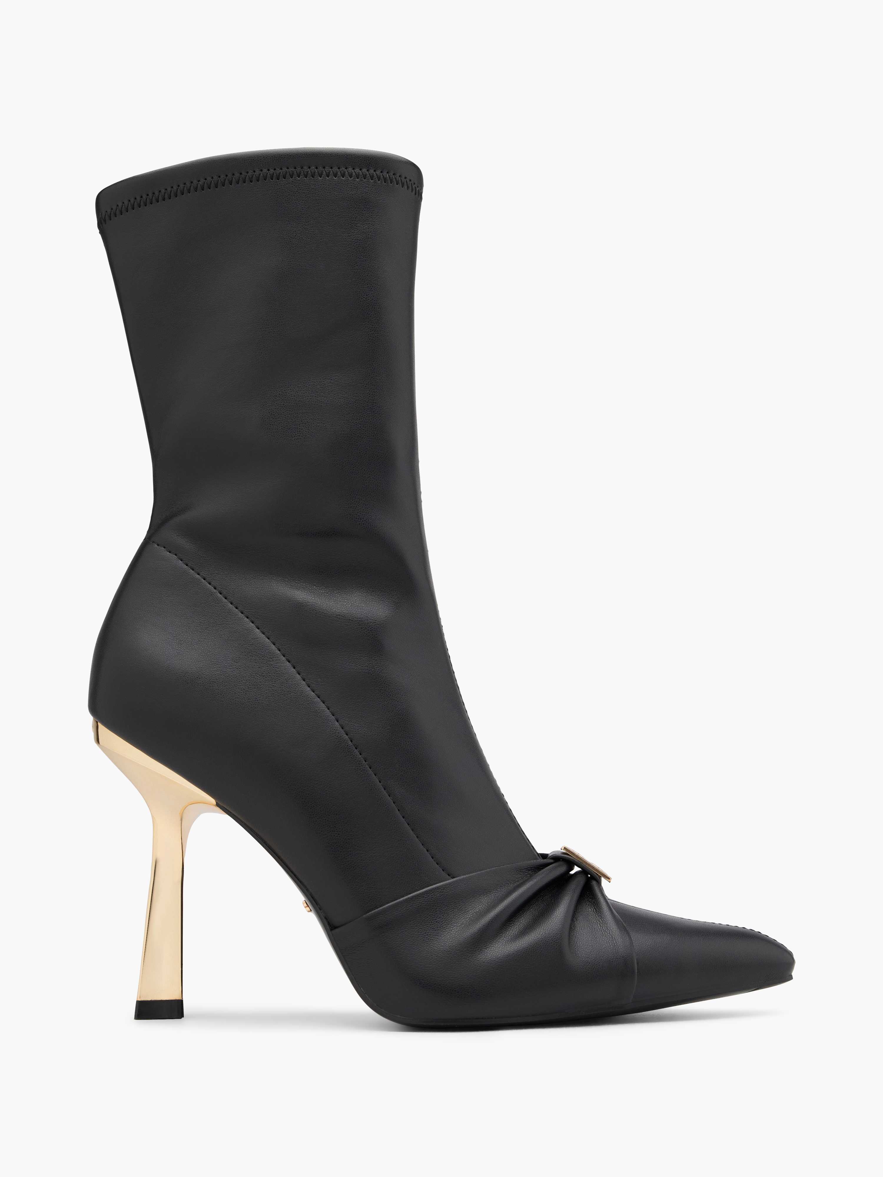 Schwarzer Heel-Boot mit goldenem Absatz