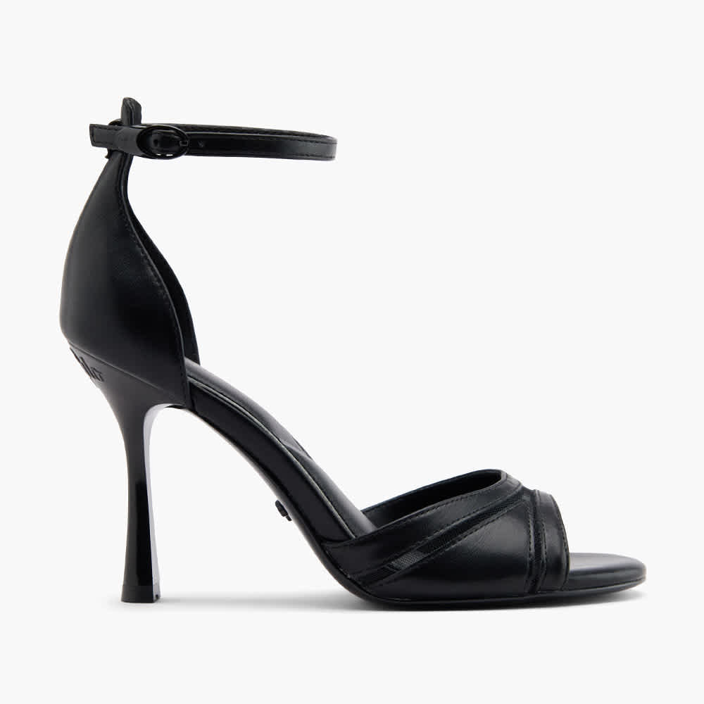 Schwarzer High Heel im Haute Couture-Look