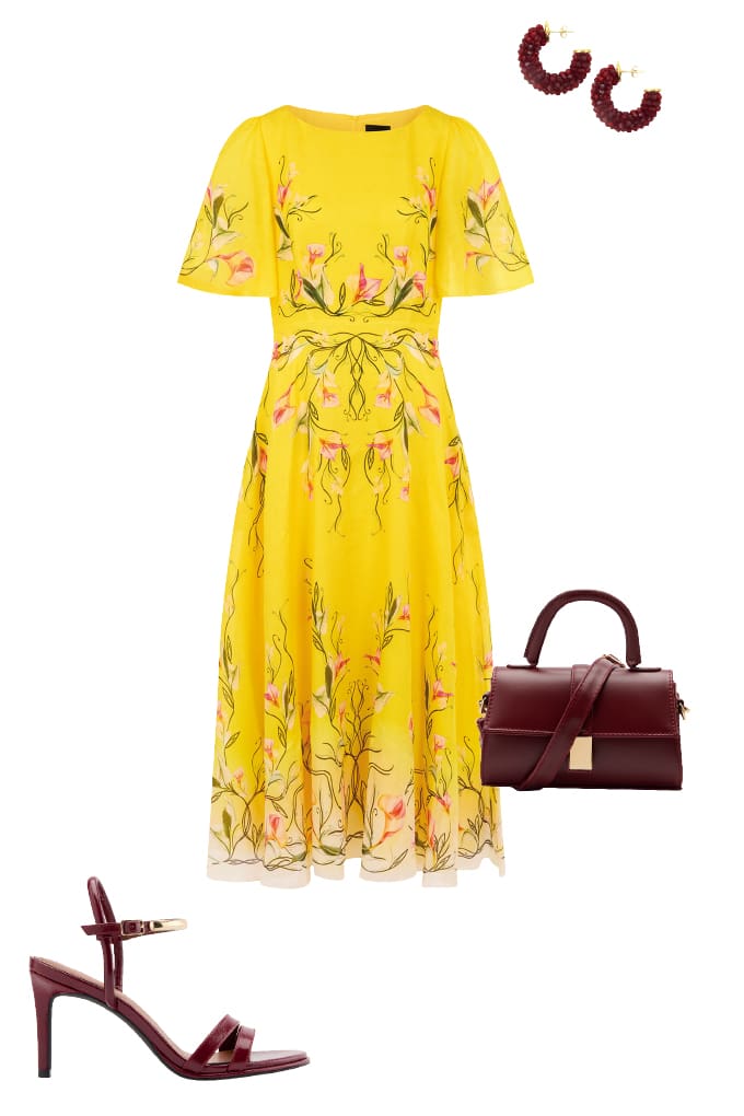 Sonnengelbes Midikleid mit bordeauxroter Handtasche
