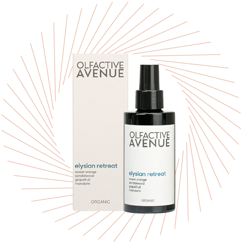 Raumduft-Spray „Elysian Retreat" von Olfactive Avenue in schwarzer Flasche neben Verpackung