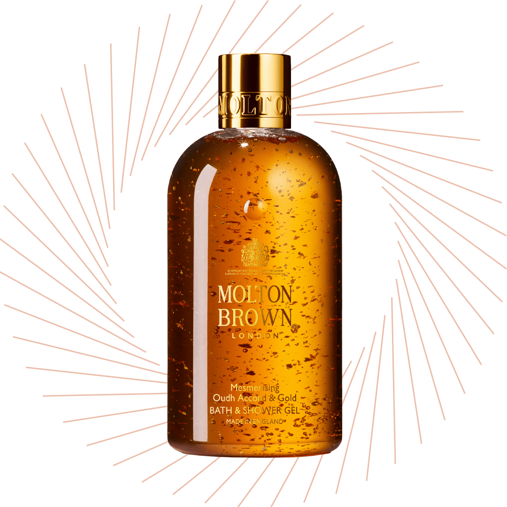 Molton Brown Bade- und Duschgel Oudh Accord & Gold in bernsteinfarbener Flasche
