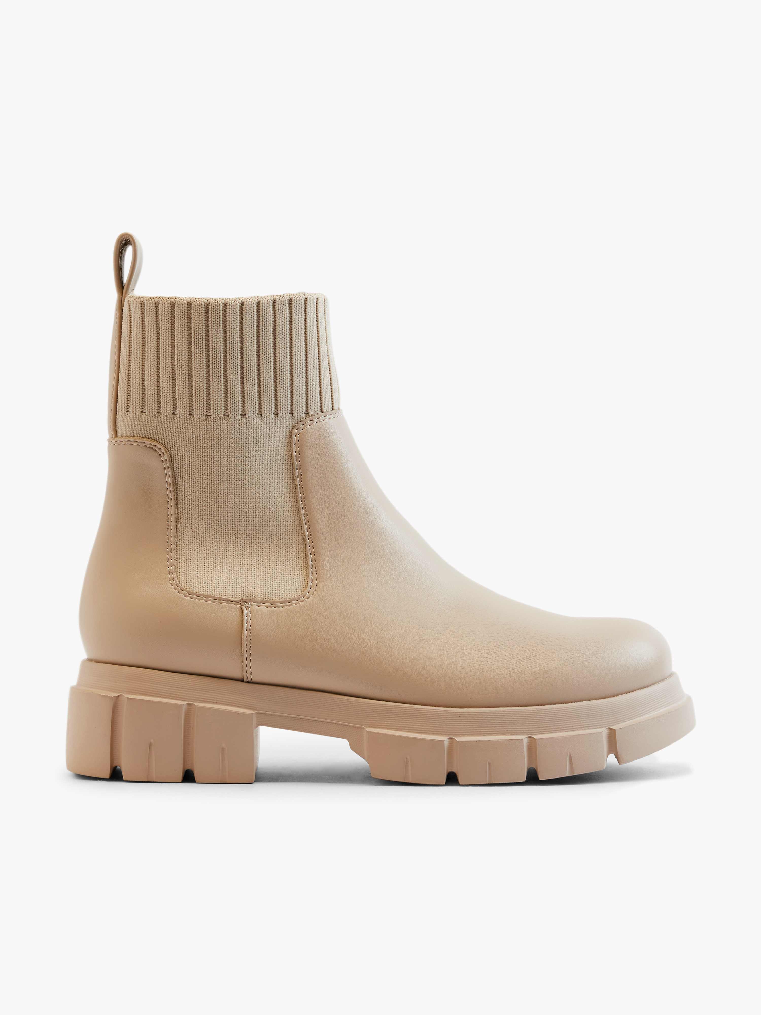 Beige Stiefelette mit elastischem Strickschaft und robuster Profilsohle