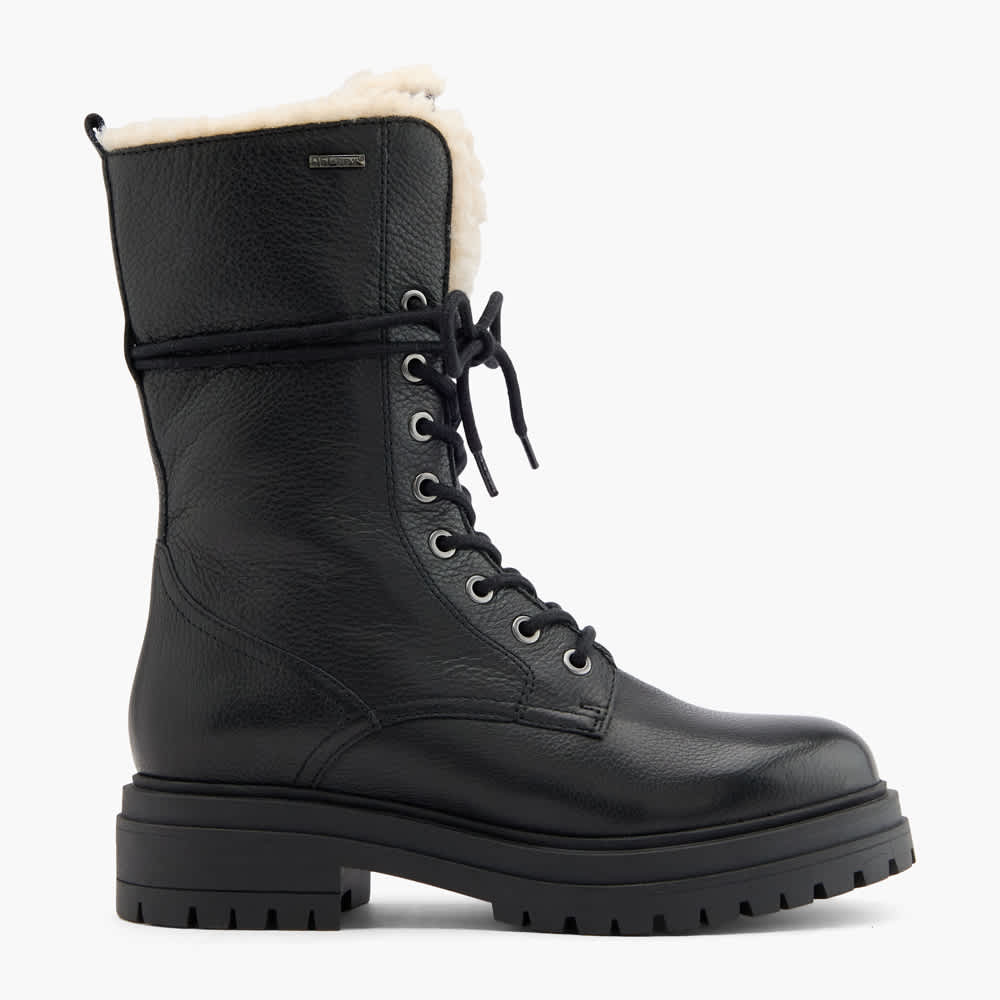 Schwarzer Winterboot mit gelb-weißem Innenfell