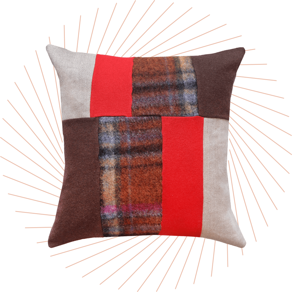 Kissen mit schwarz-grau-roter Musterung