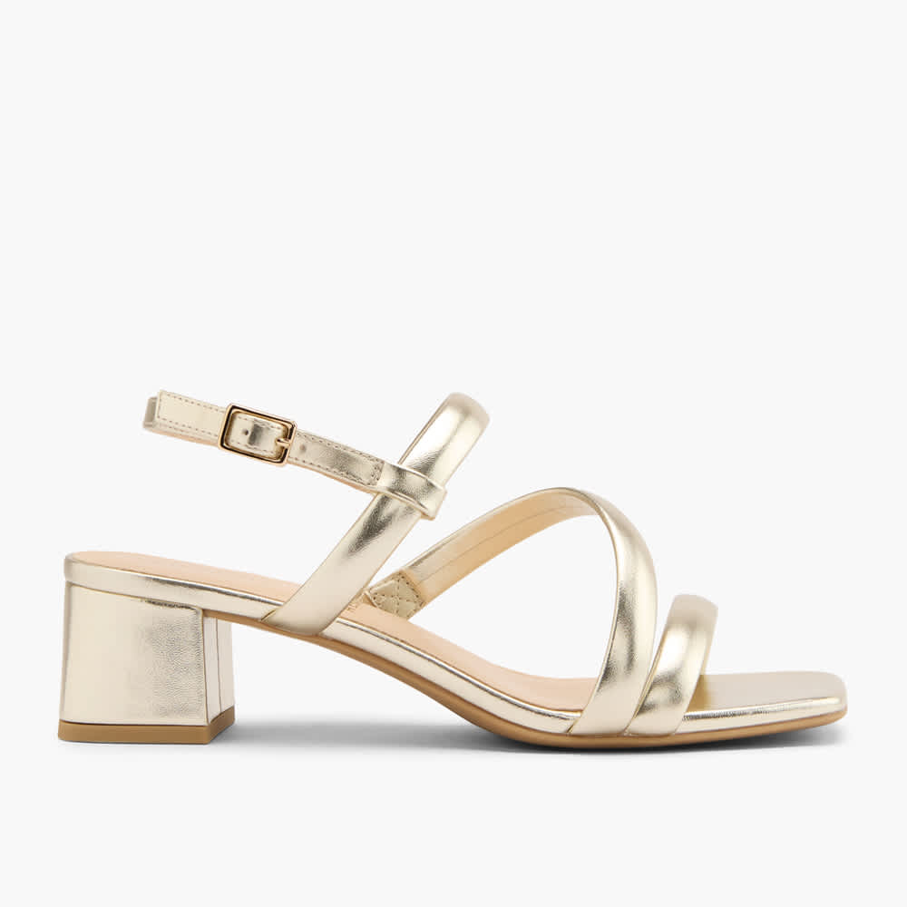 Weiß-silberner Pumps mit mehreren Schlaufen und Blockabsatz