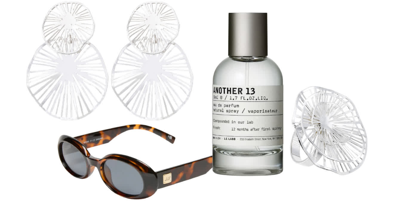 Leopard-Style Sonnenbrille neben Parfumflasche "Another 13"