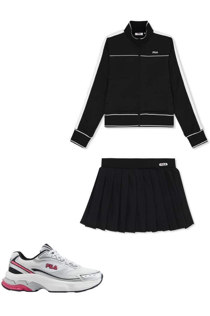 Schwarze Sportjacke, passender Minirock und weiße FILA-Sneaker