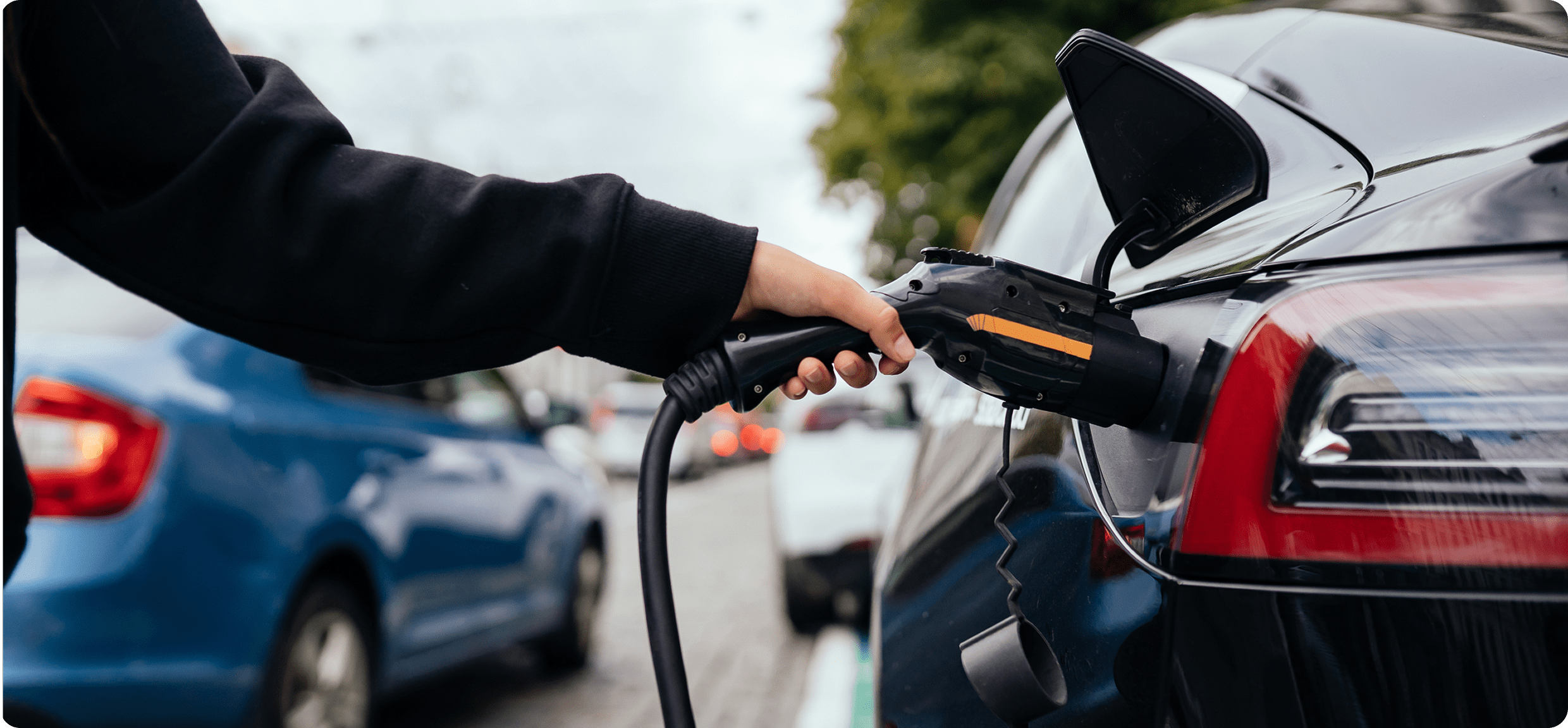 Driver charging EV