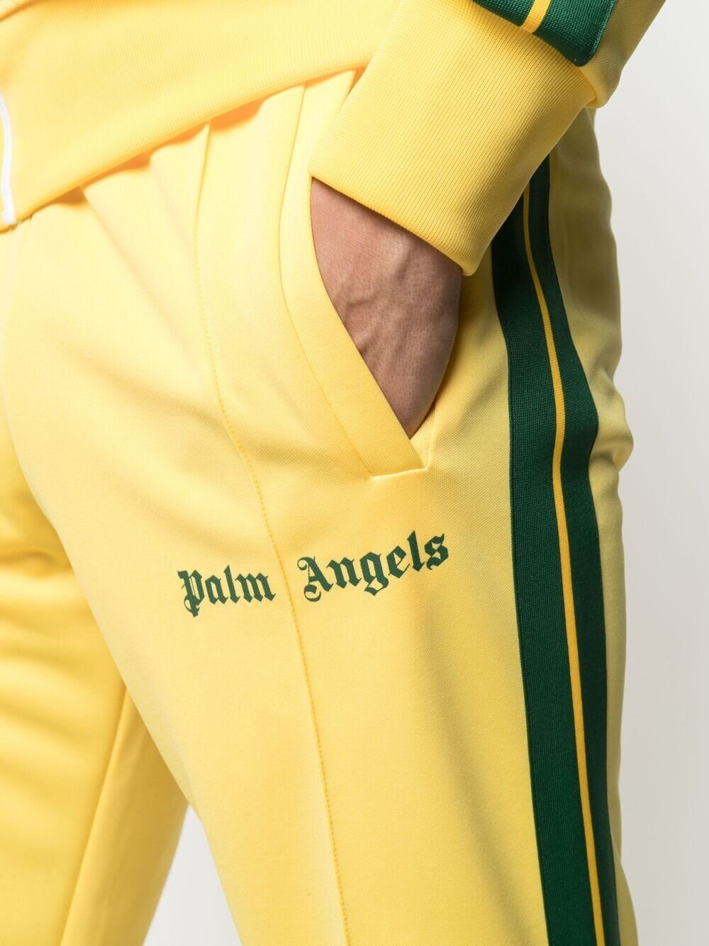 PALM ANGELS LOGO PRINT TRACK PANTS. Vertical stripes