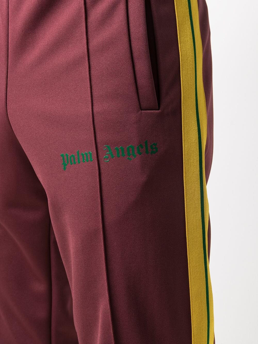 PALM ANGELS LOGO PRINT TRACK PANTS. Vertical stripes