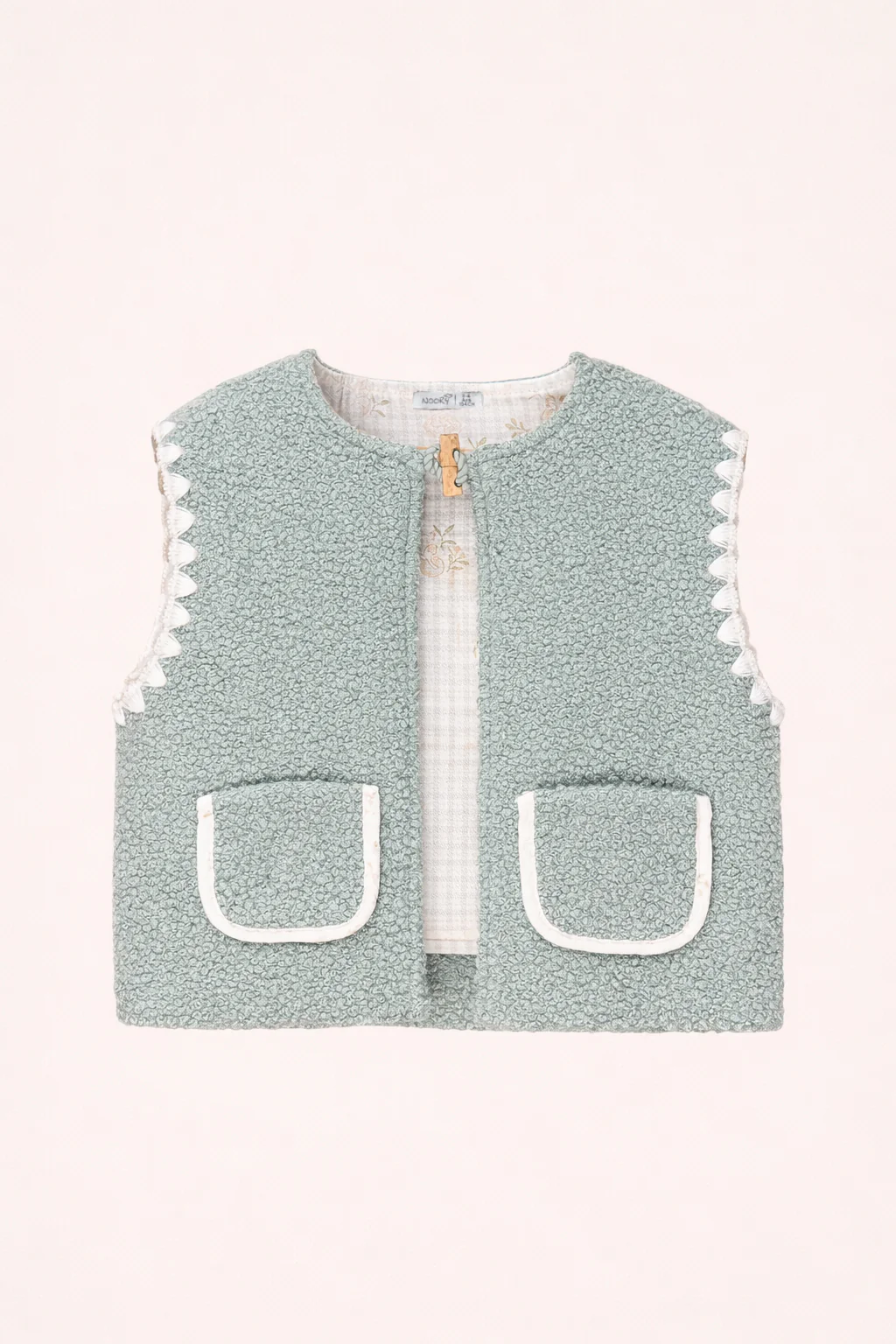Gilet bébé sans manches en tissu bouclette