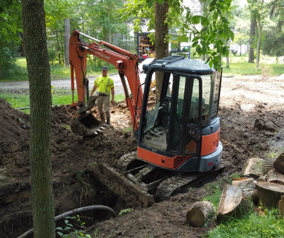 Hitachi mini excavator working in a tight area