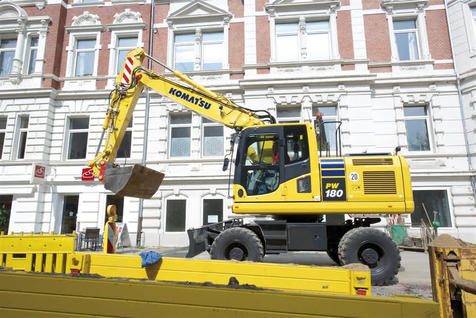 Wheeled excavator in urban area