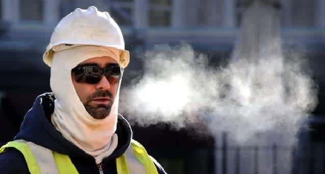 Construction worker in winter wearing ppe