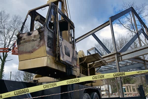 damaged construction equipment on a construction site