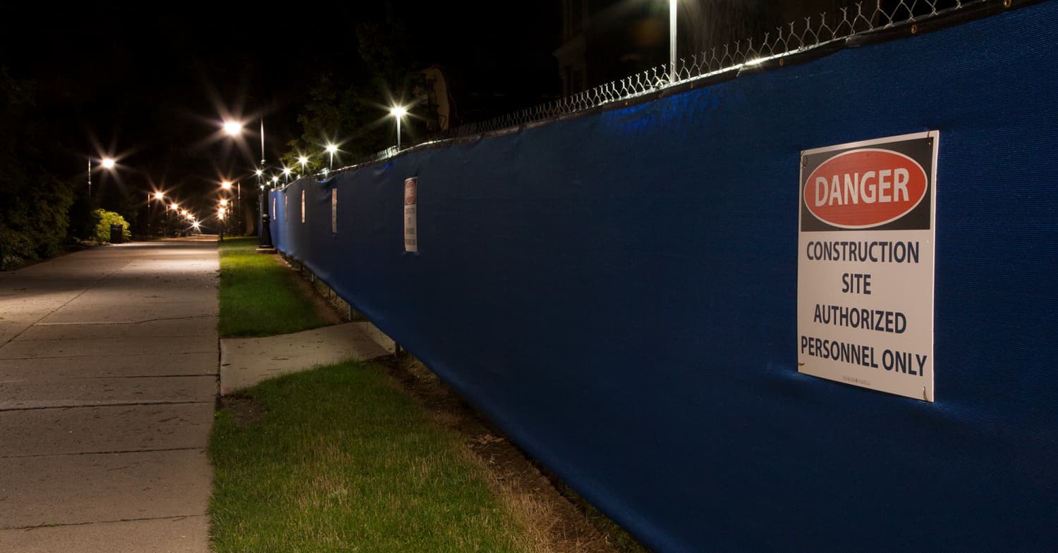 safety wall and lights around construction site