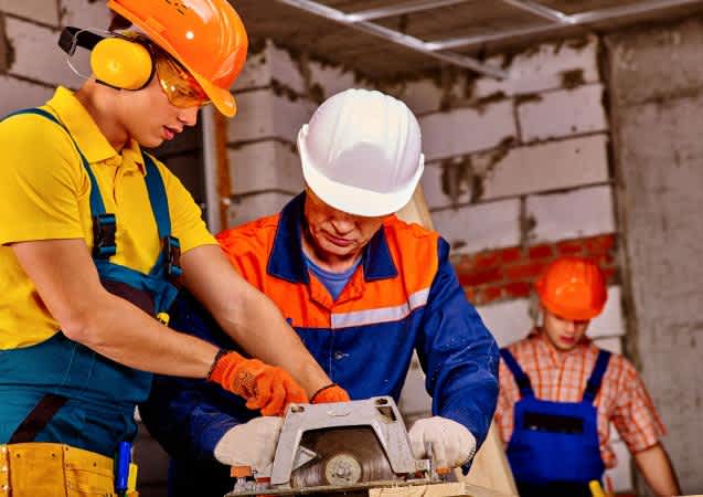 construction workers wearing hearing protection