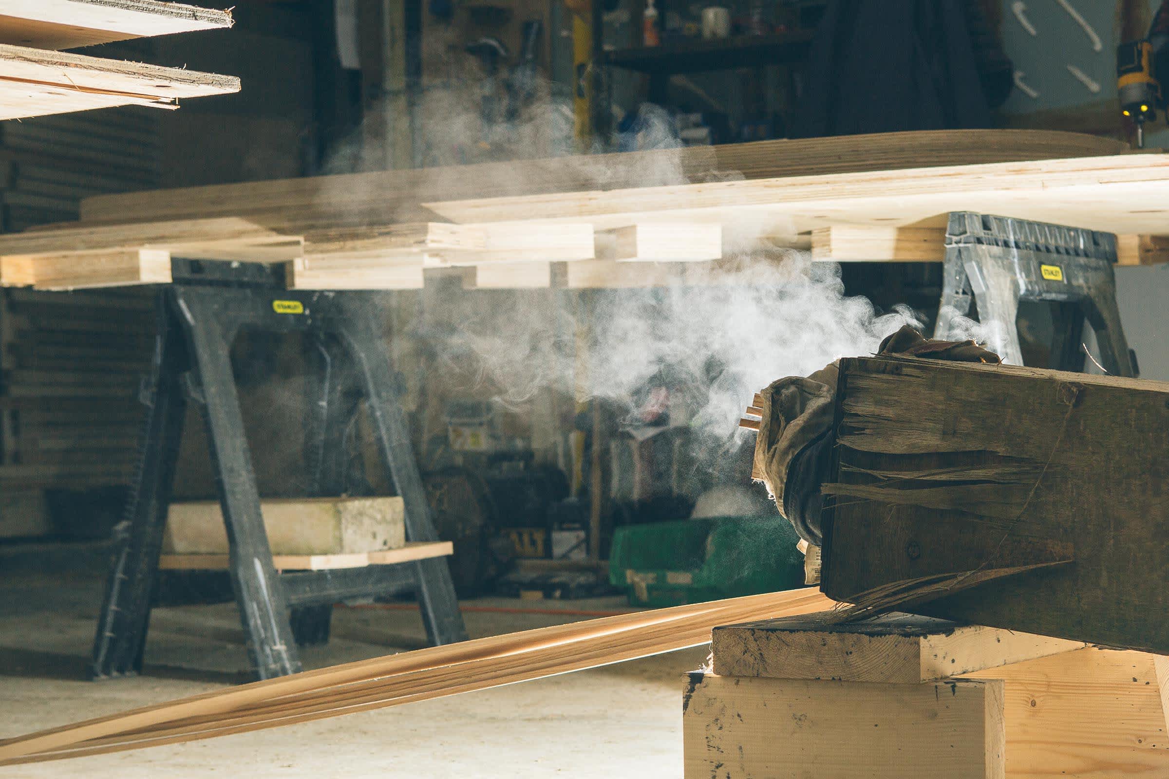 steam box for steam bending wood with lumber in background