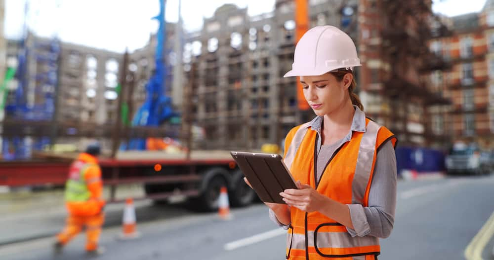 Construction worker on tablet 