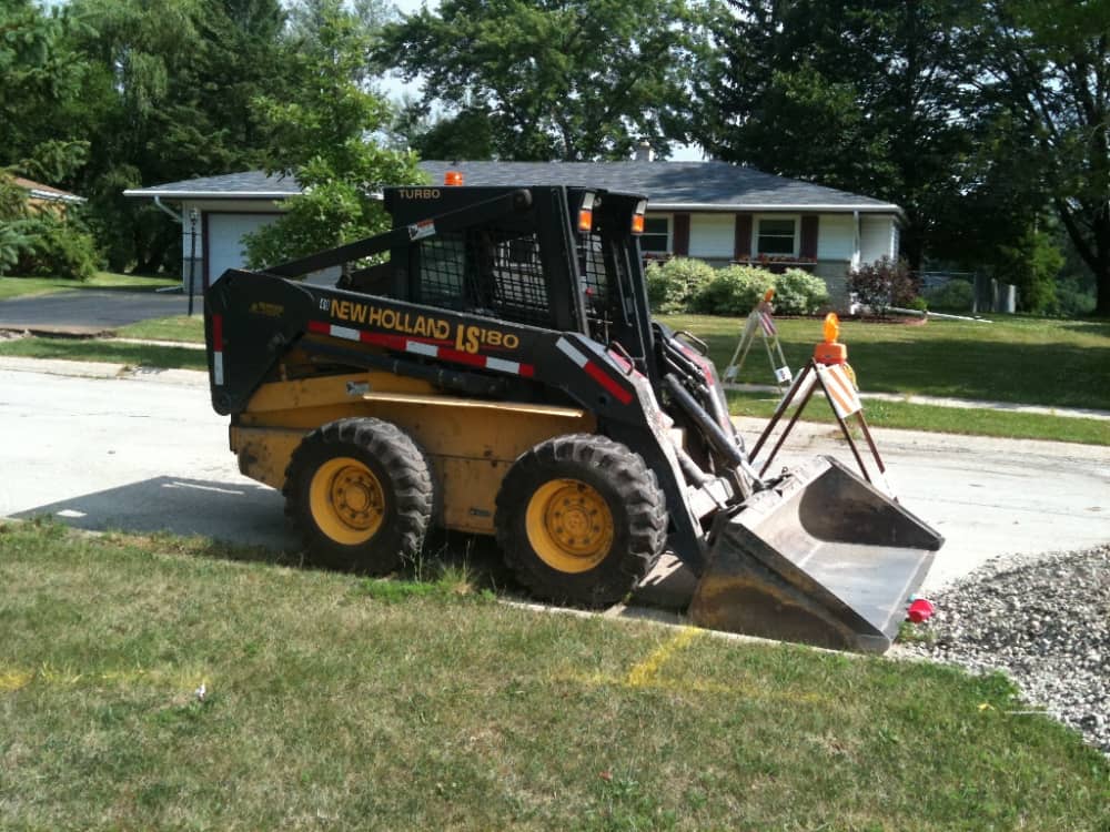 Skid Steer moving gravel